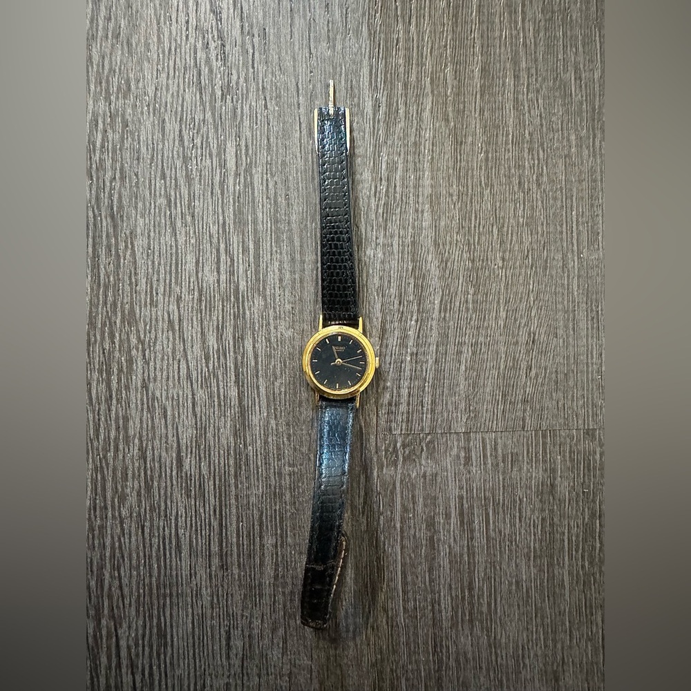Seiko Elegant Black and Gold Watch